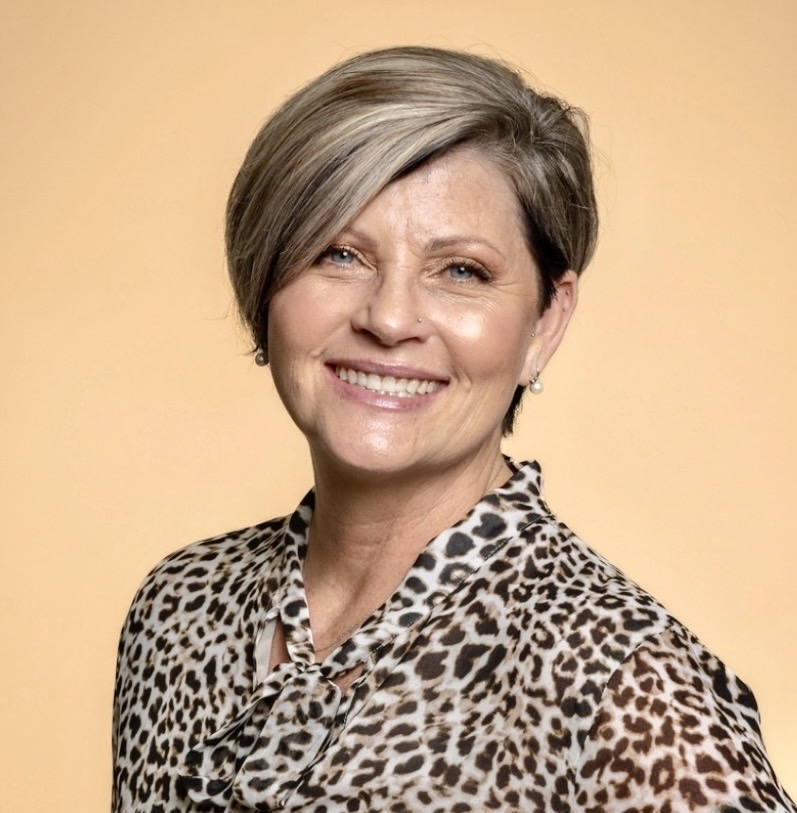 Portrait of Marci Nettles, author and speaker, in soft natural light